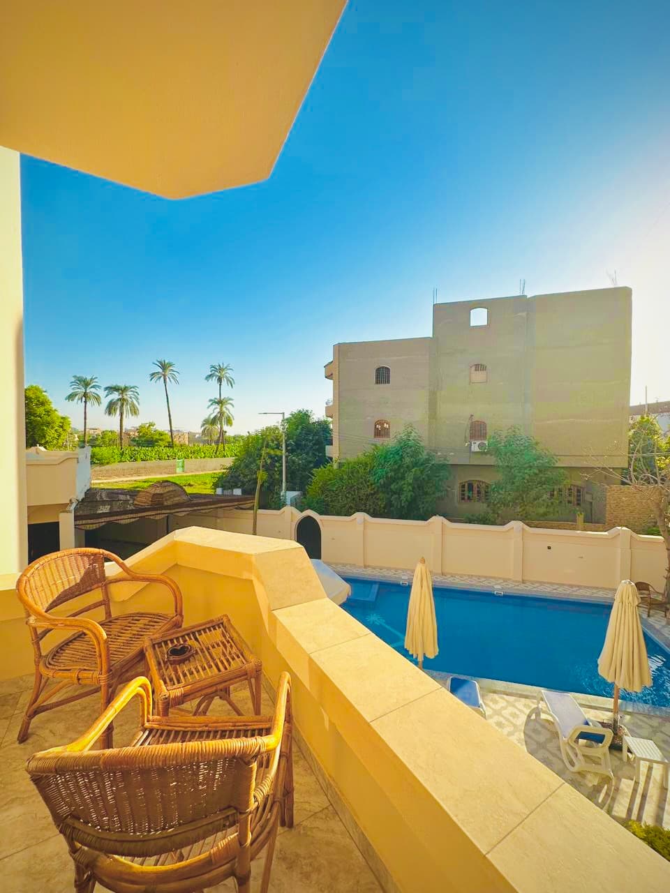 Pool view from hotel room balcony